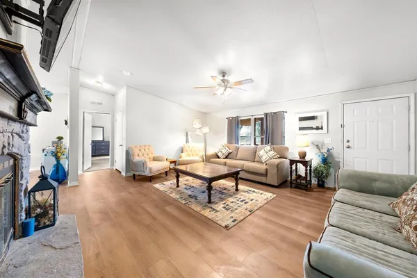 a living room with furniture and a couch