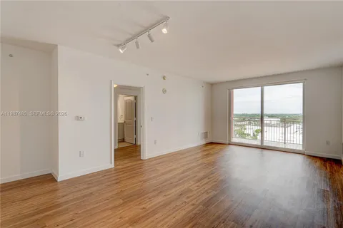 a kitchen with stainless steel appliances a refrigerator stove and sink