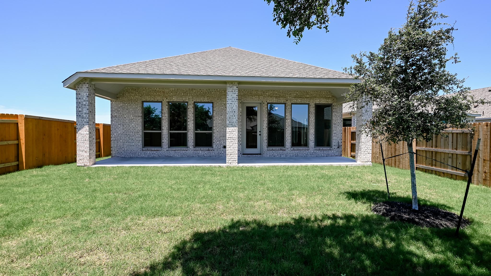 126 Basket Flower Loop Kyle, TX 78640 - Photo 21 of 29 a view of a house with garden