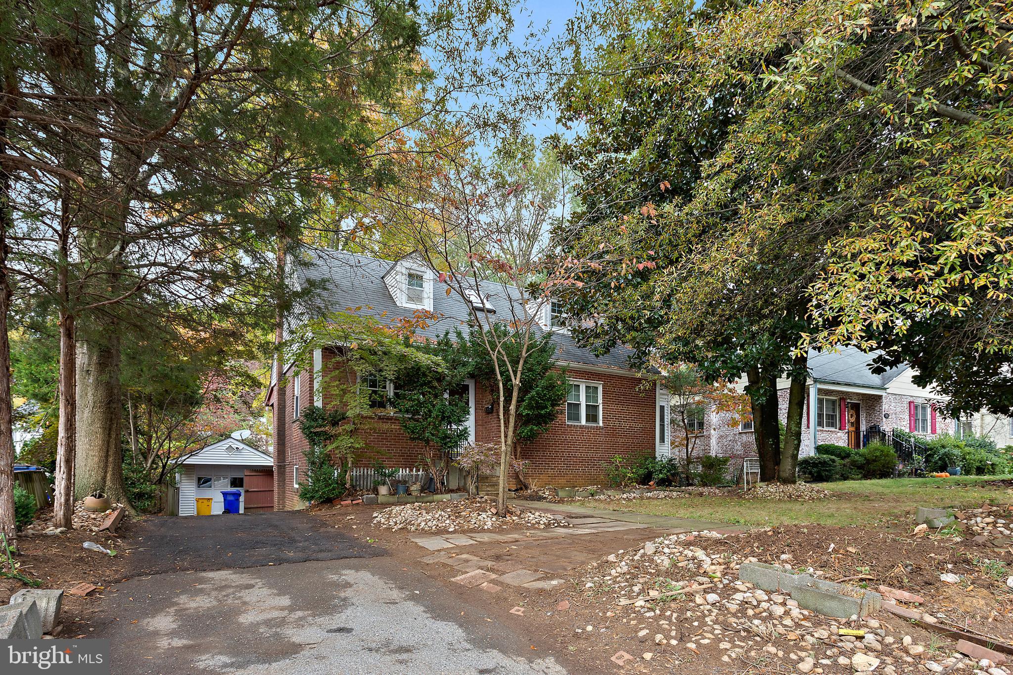 5913 Rolston Road Bethesda, MD 20817 - Photo 1 of 37 a view of a house with a tree in front
