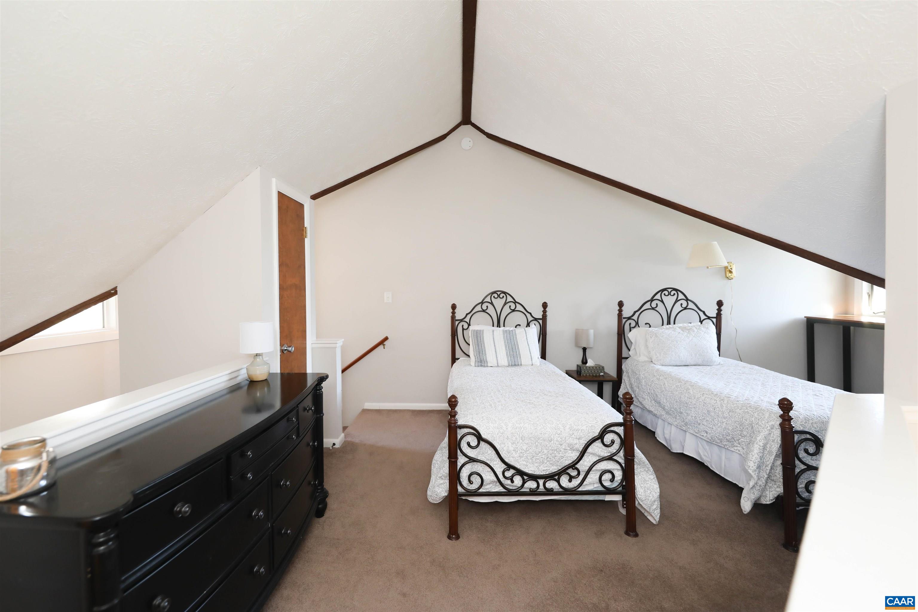 463 3 Ridges Wintergreen, VA 22967 - Photo 26 of 30 a bedroom with a bed and a dresser