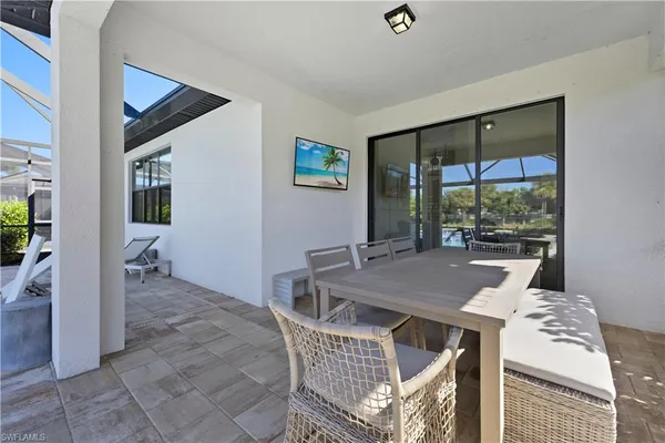 a view of a livingroom with furniture and window