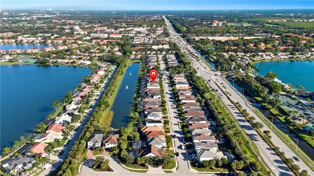 an aerial view of residential houses and outdoor space