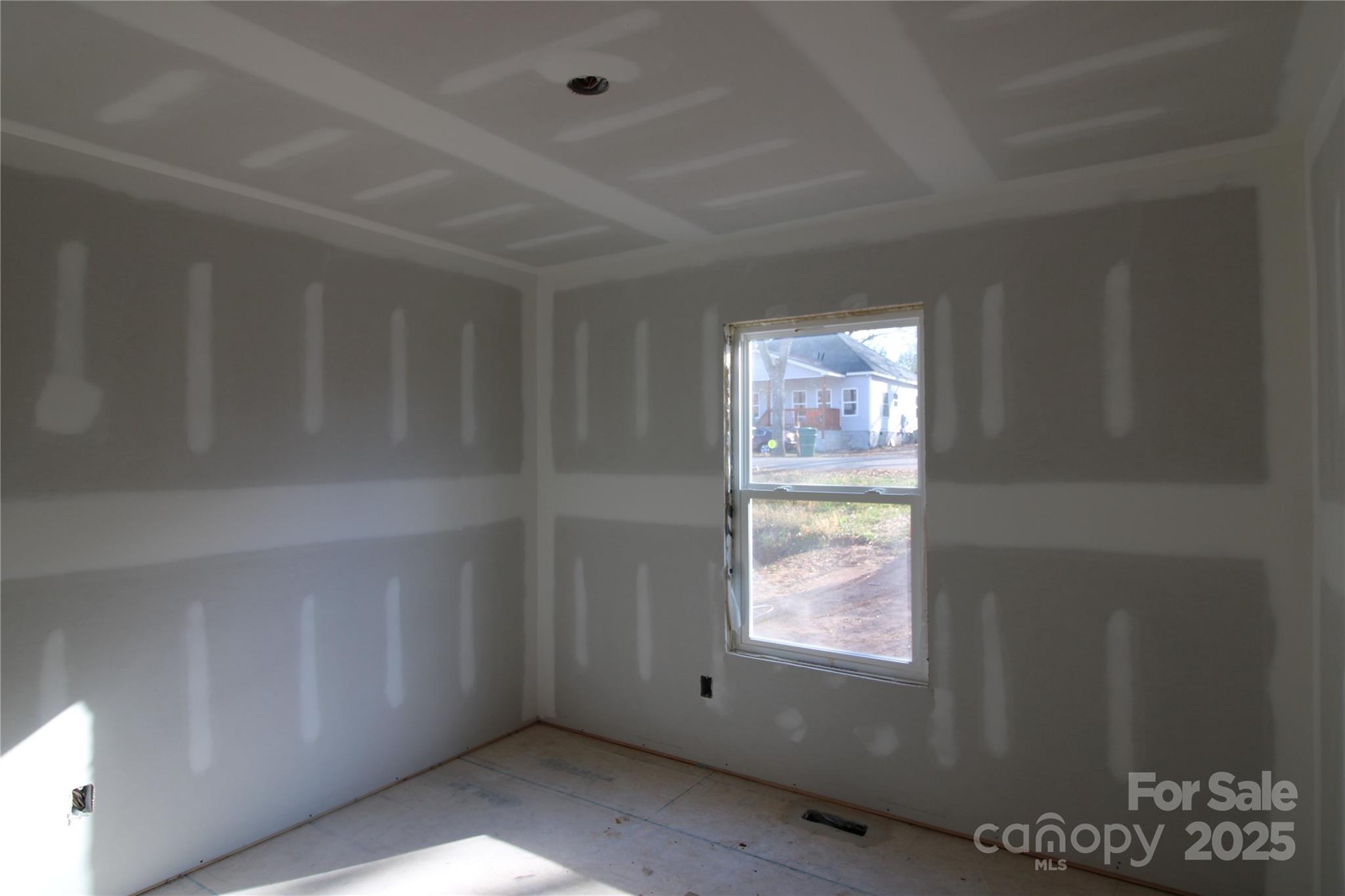 152 Hinton Street Chester, SC 29706 - Photo 7 of 11 a view of an empty room and window