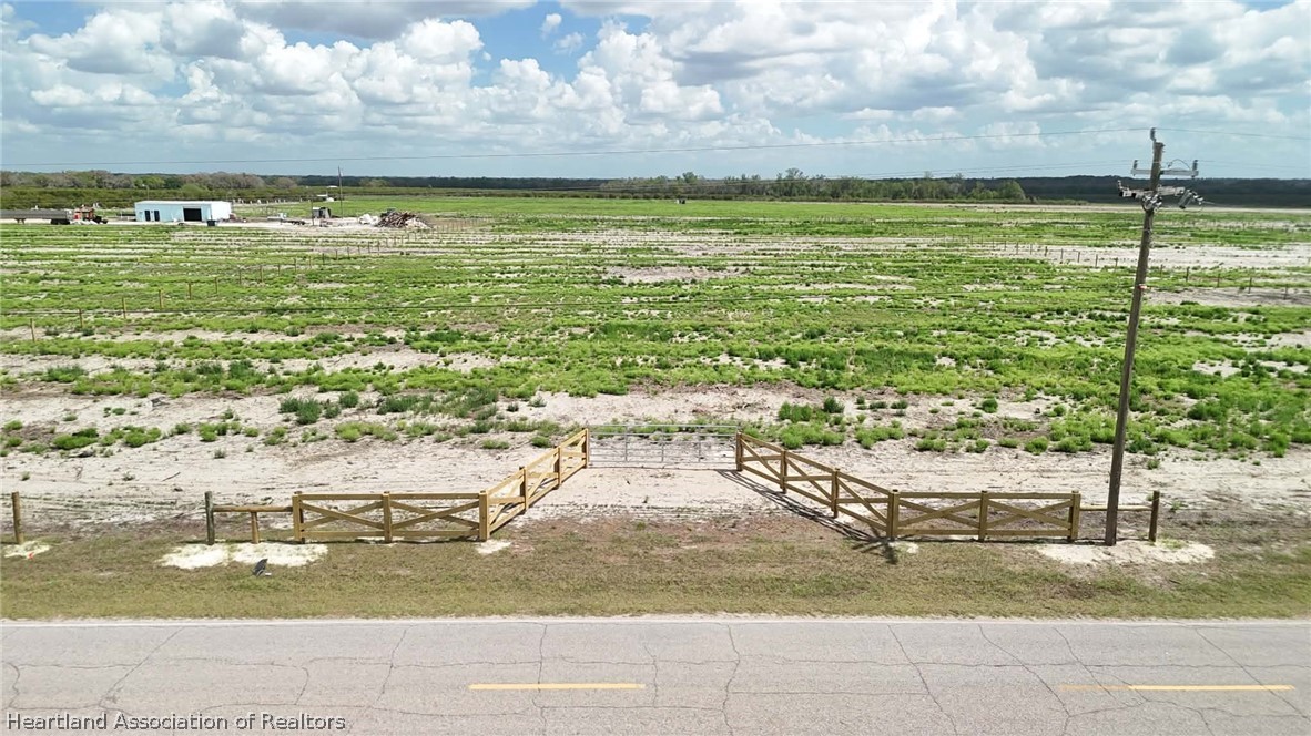 Kelly Roberts Road Zolfo Springs, FL 33890 - Photo 13 of 15 a view of a swimming pool and a yard