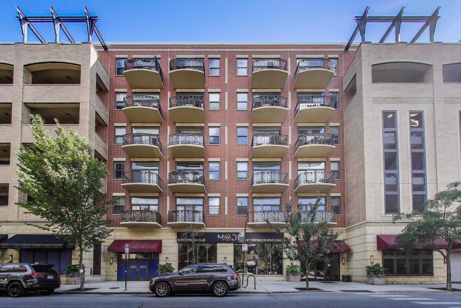 a front view of a building with a street
