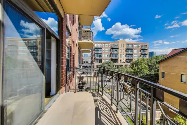 a view of a balcony with city view