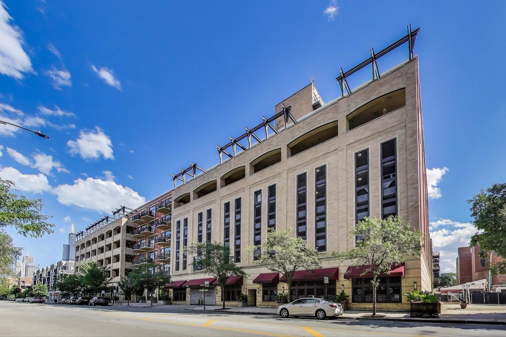 1301 West Madison Street, Unit 311 Chicago, IL 60607 - Photo 2 of 21 a view of a building with a street