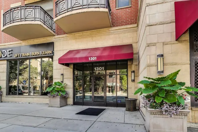 a potted plant sitting in front of a building