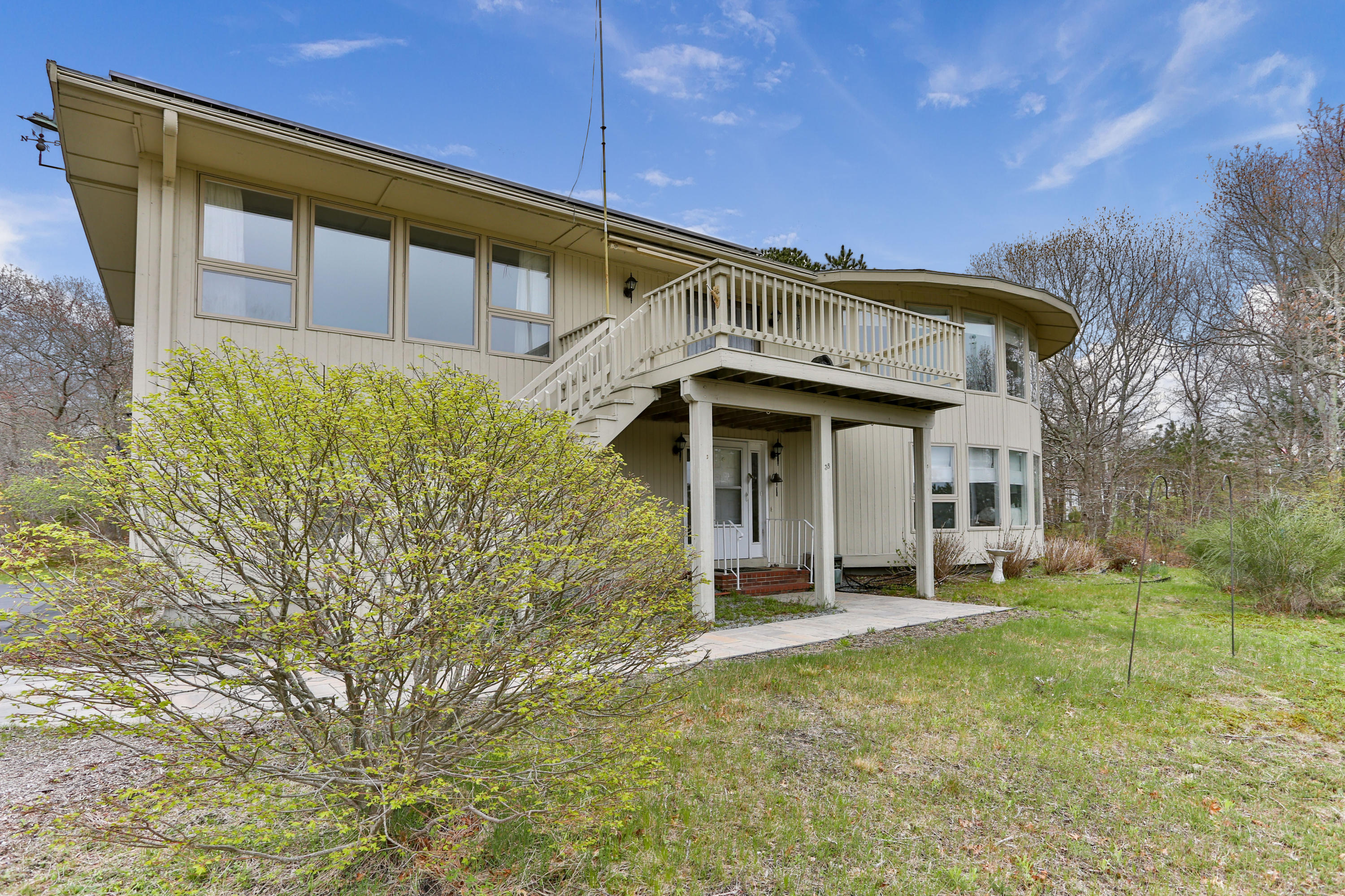 38 Weather Deck Road Bourne, MA 02532 - Photo 1 of 40 a view of a house with a yard