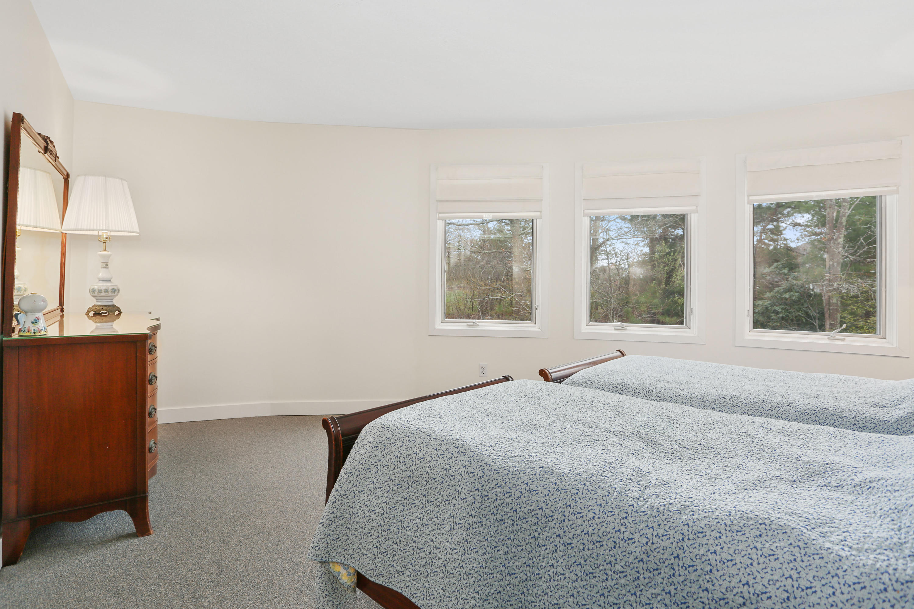 38 Weather Deck Road Bourne, MA 02532 - Photo 12 of 40 a bedroom with a bed and a window