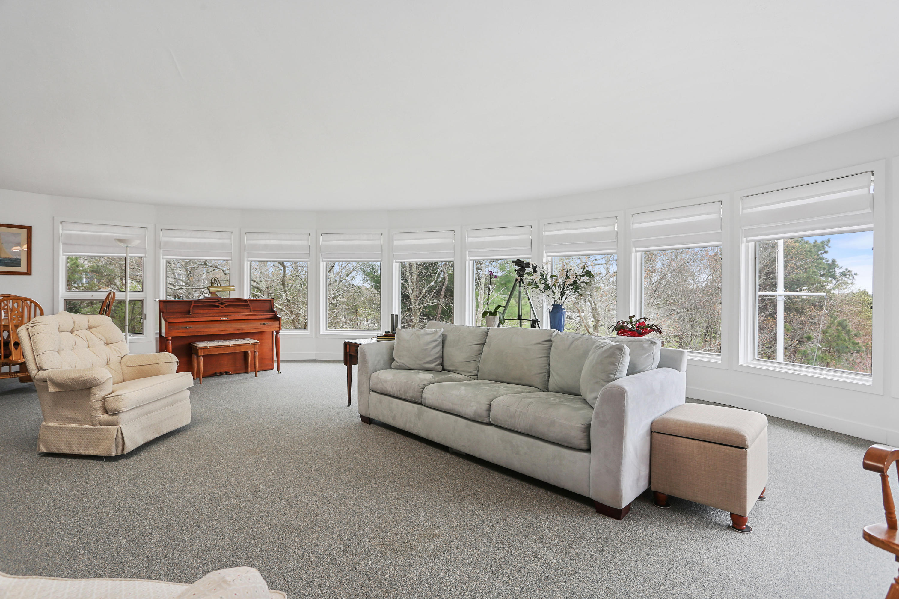 38 Weather Deck Road Bourne, MA 02532 - Photo 17 of 40 a living room with furniture and a large window