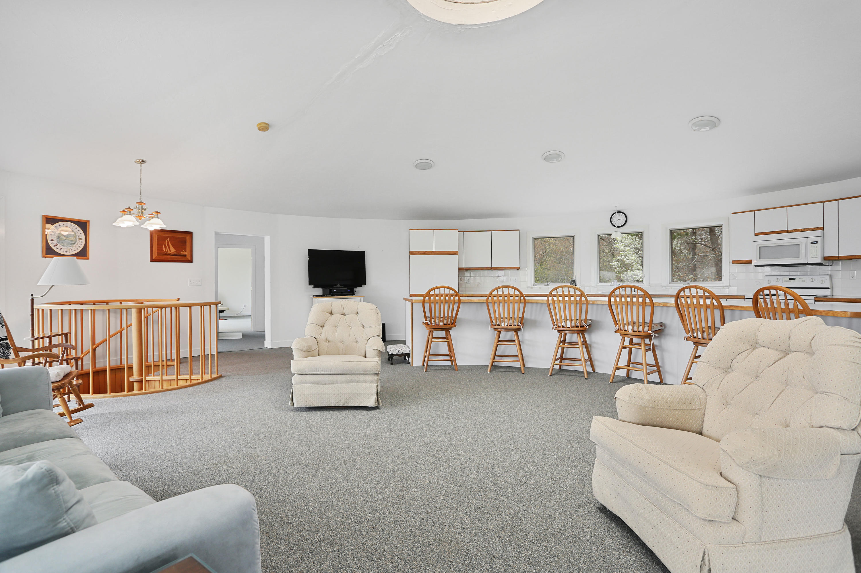 38 Weather Deck Road Bourne, MA 02532 - Photo 19 of 40 a living room with furniture and a flat screen tv