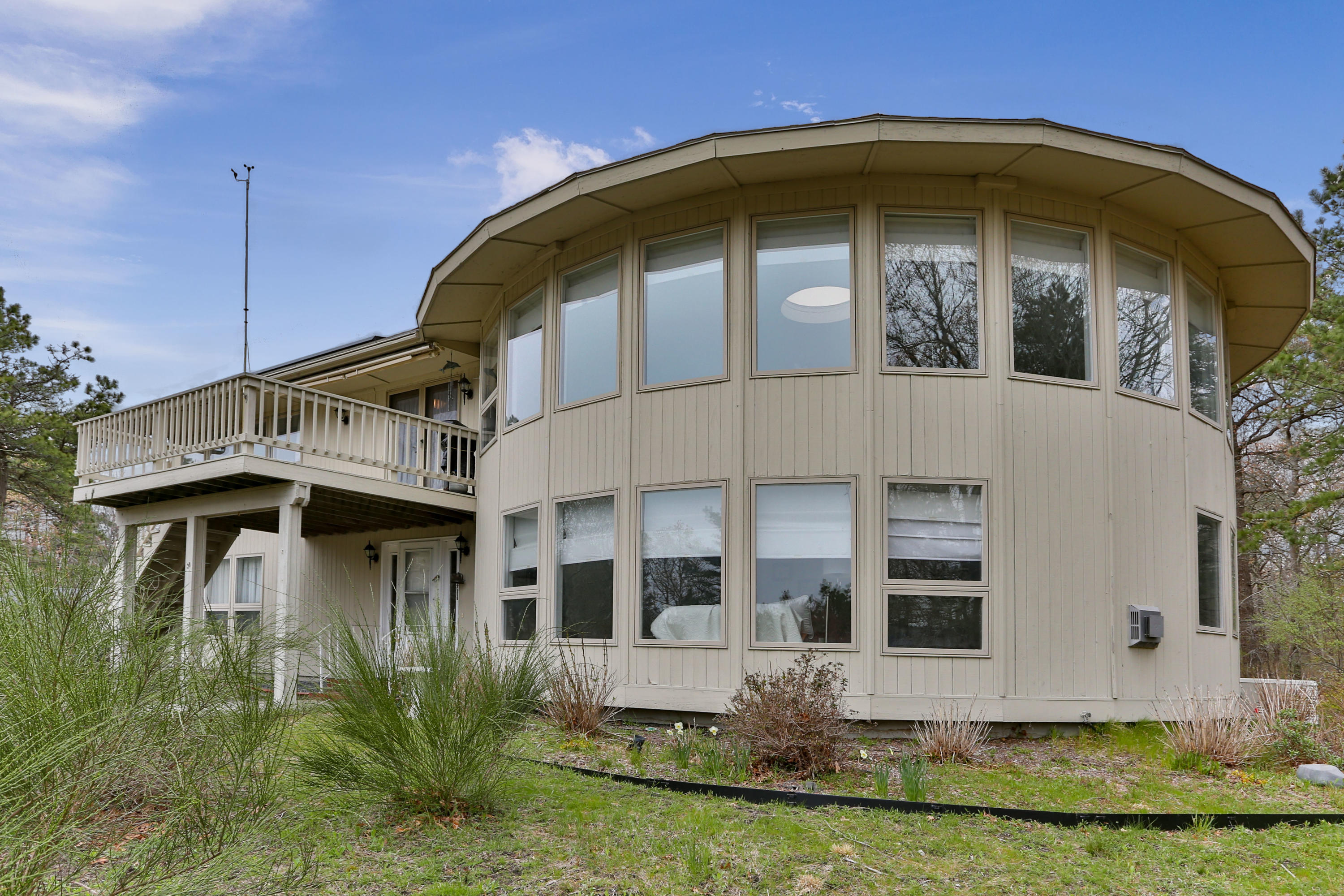 38 Weather Deck Road Bourne, MA 02532 - Photo 2 of 40 a front view of a house with a yard