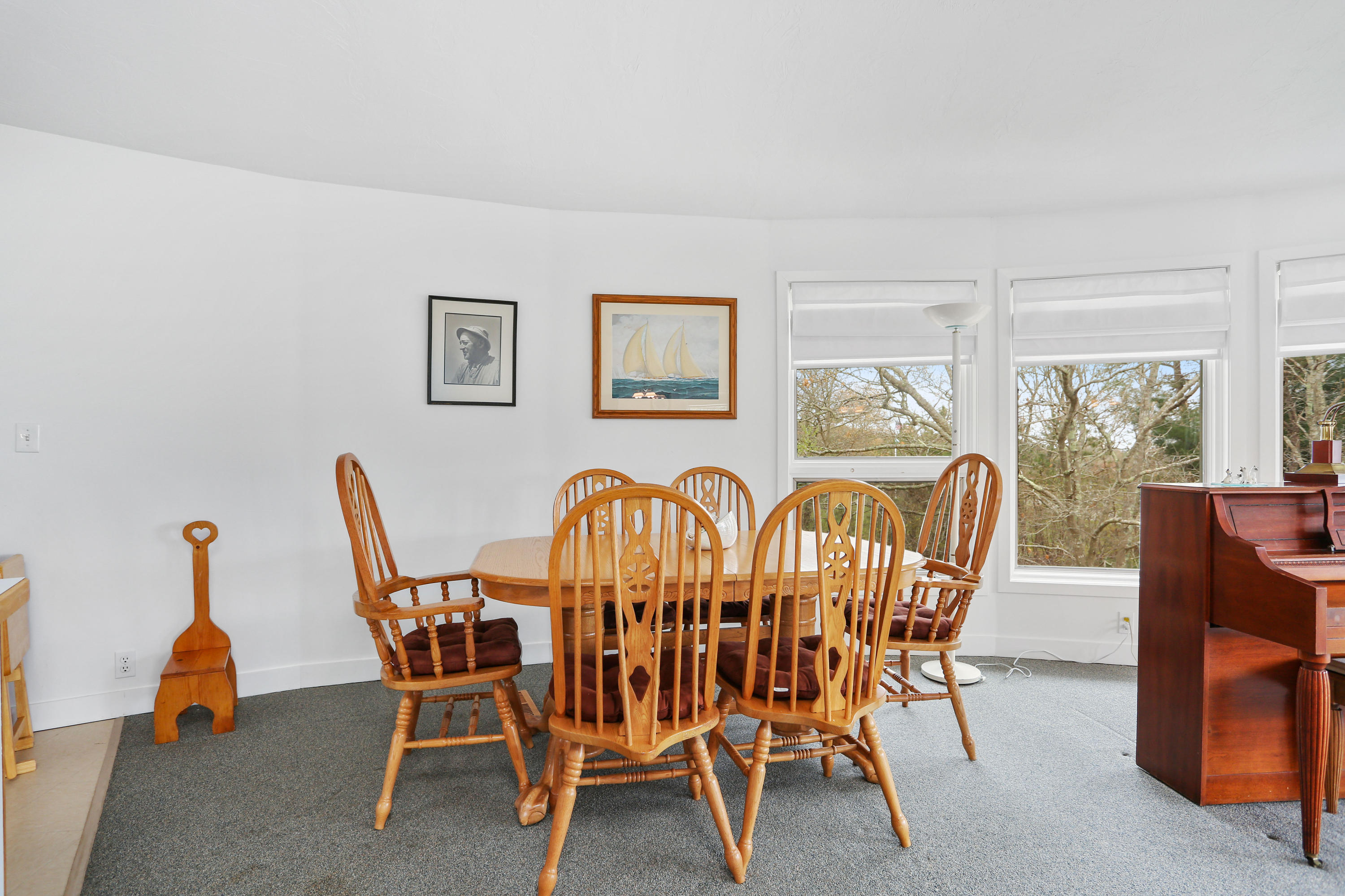 38 Weather Deck Road Bourne, MA 02532 - Photo 26 of 40 a view of a dining room with furniture window and outside view