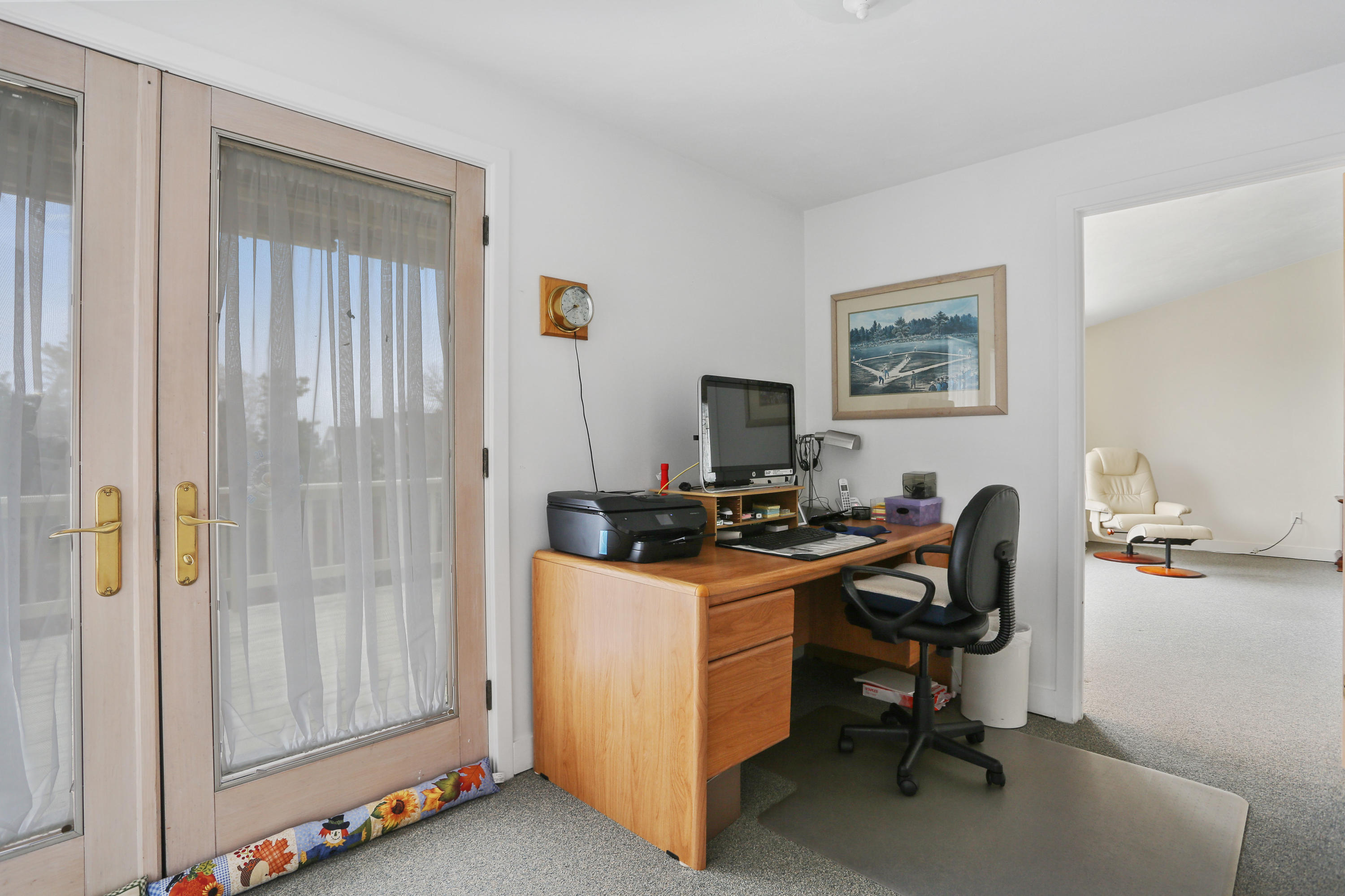 38 Weather Deck Road Bourne, MA 02532 - Photo 27 of 40 a view of a workspace with furniture and a window