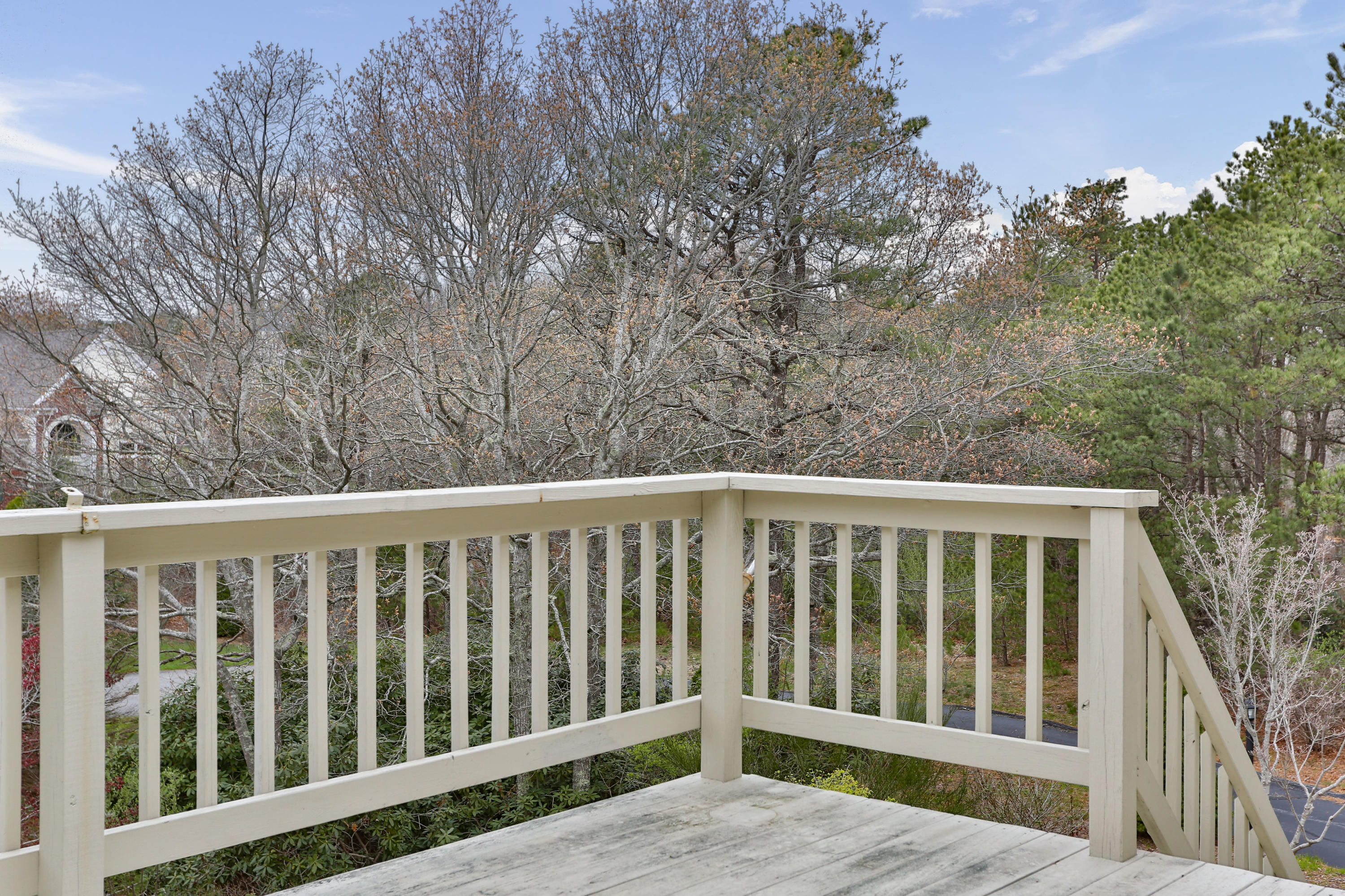 38 Weather Deck Road Bourne, MA 02532 - Photo 32 of 40 a balcony with yard