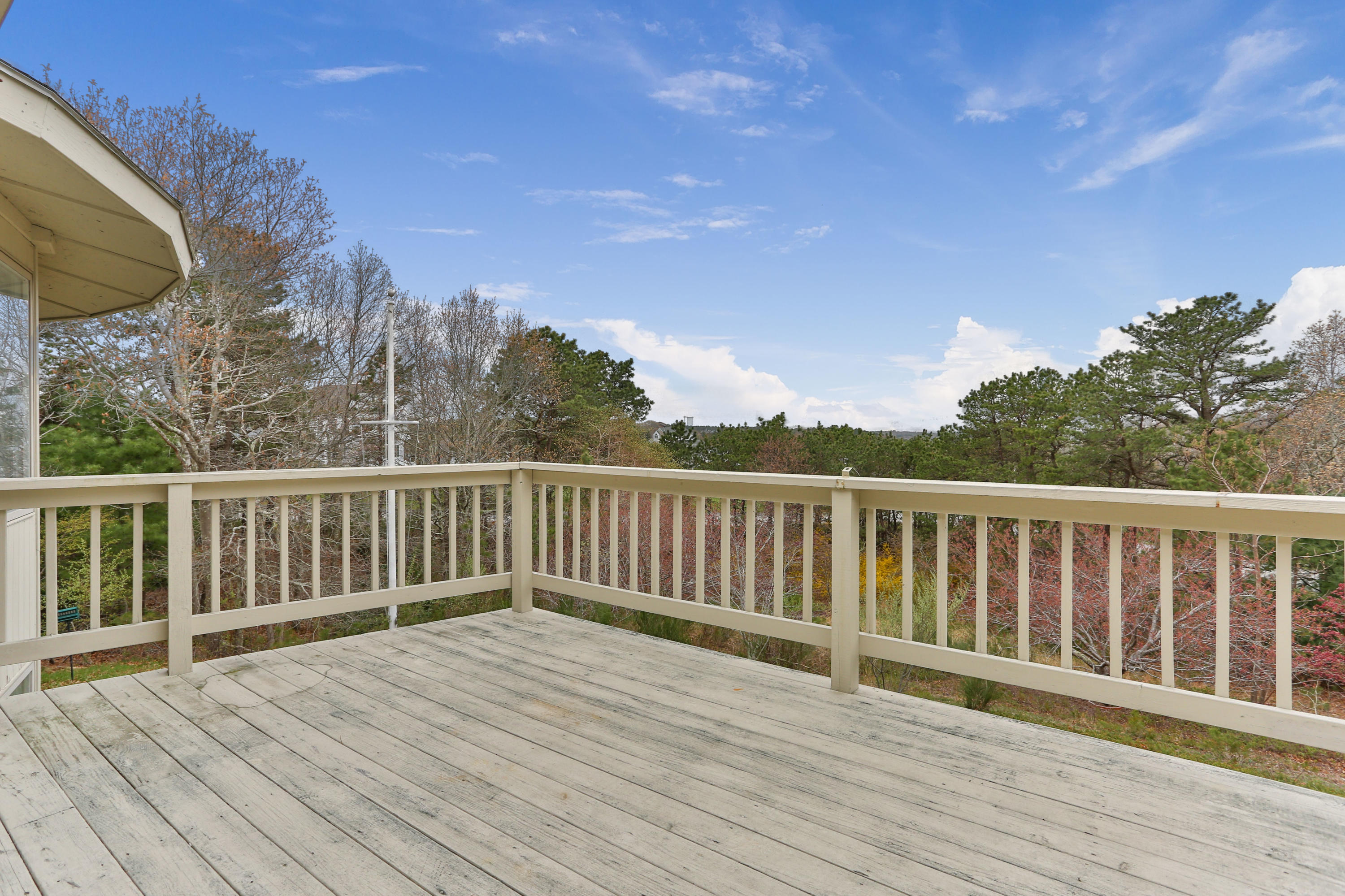 38 Weather Deck Road Bourne, MA 02532 - Photo 33 of 40 a view of deck with wooden floor and fence