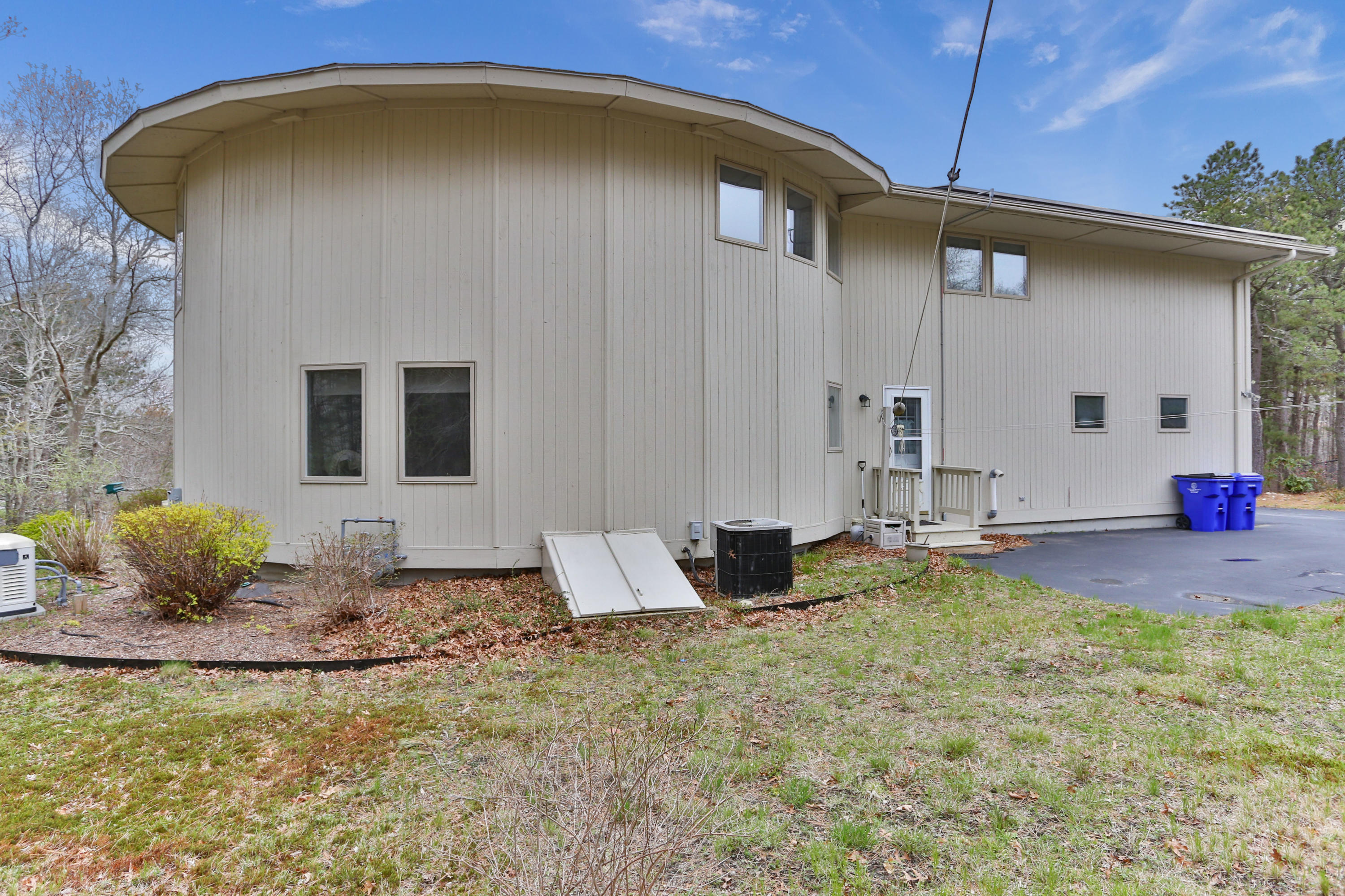 38 Weather Deck Road Bourne, MA 02532 - Photo 37 of 40 a house view with a outdoor space