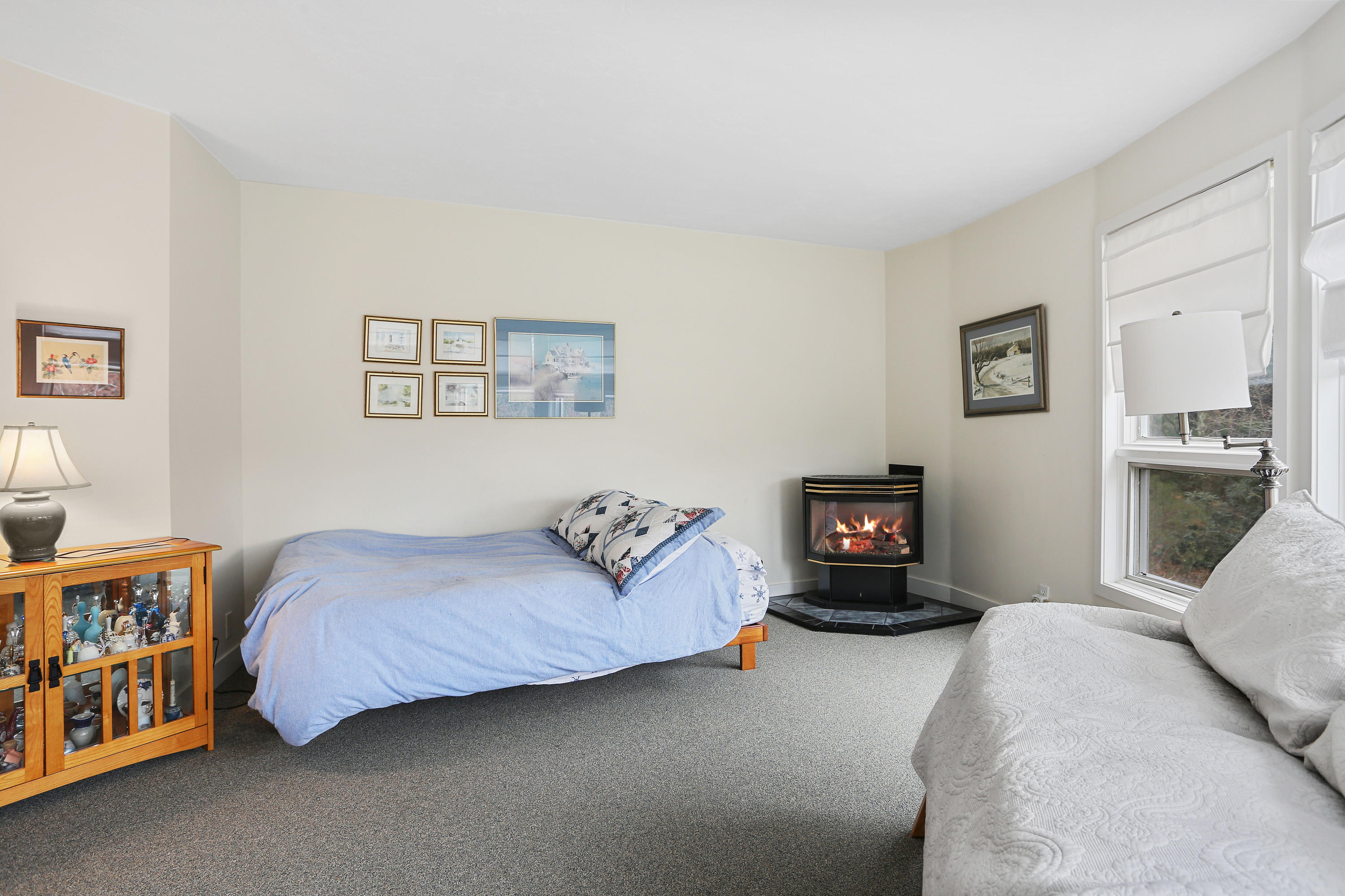 38 Weather Deck Road Bourne, MA 02532 - Photo 7 of 40 a bedroom with a bed and a tv
