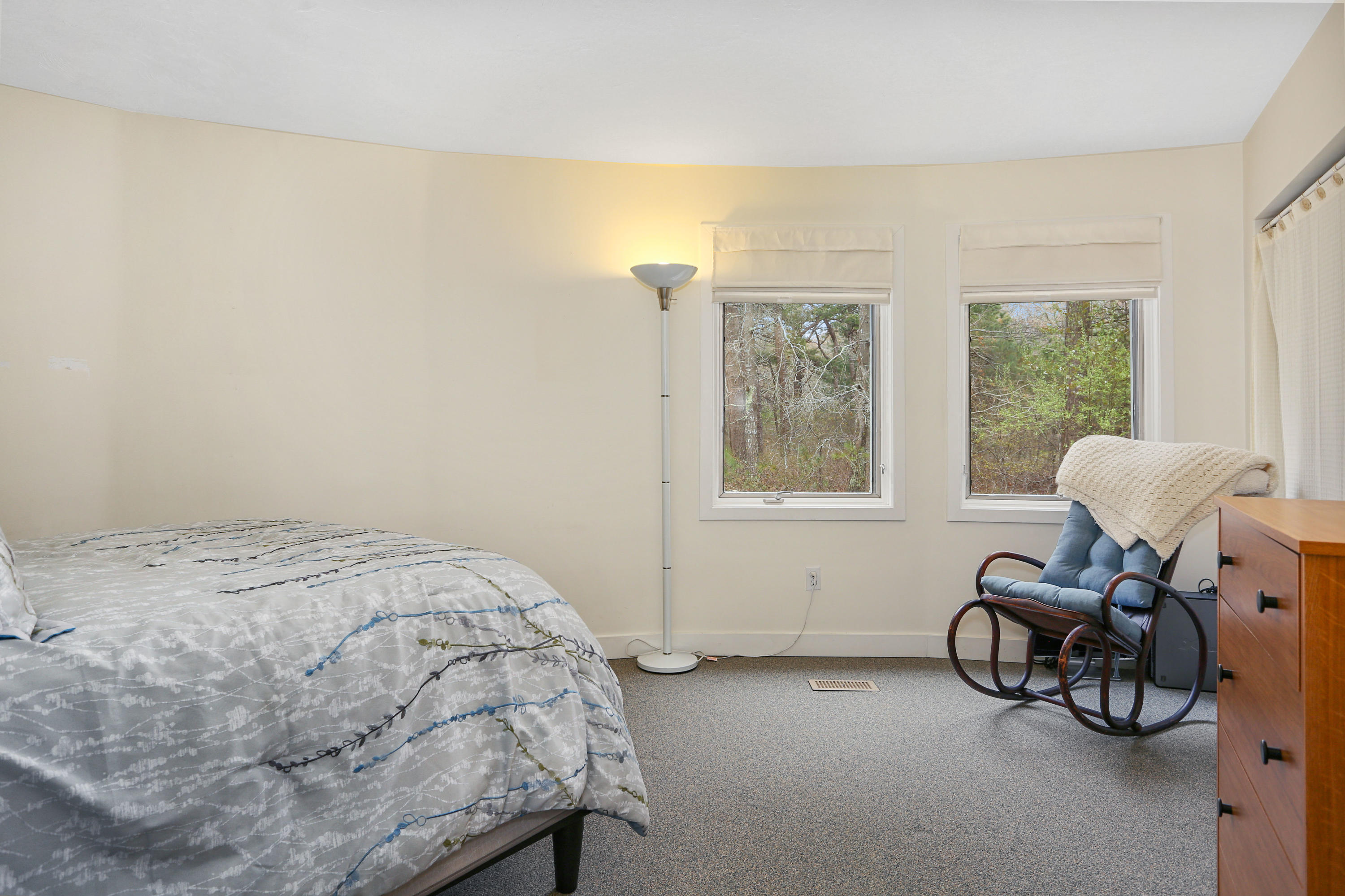 38 Weather Deck Road Bourne, MA 02532 - Photo 9 of 40 a bedroom with bed and a window