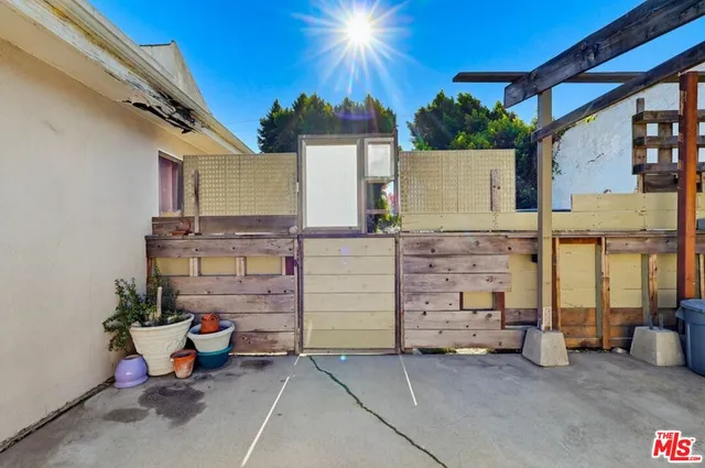 a kitchen with stainless steel appliances a stove sink and cabinets