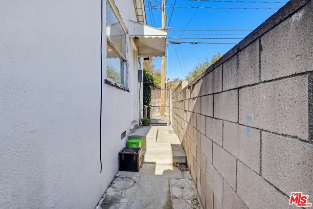 a kitchen with stainless steel appliances granite countertop a stove and a refrigerator