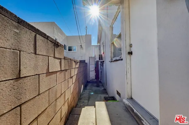 a kitchen with stainless steel appliances granite countertop a stove and a refrigerator