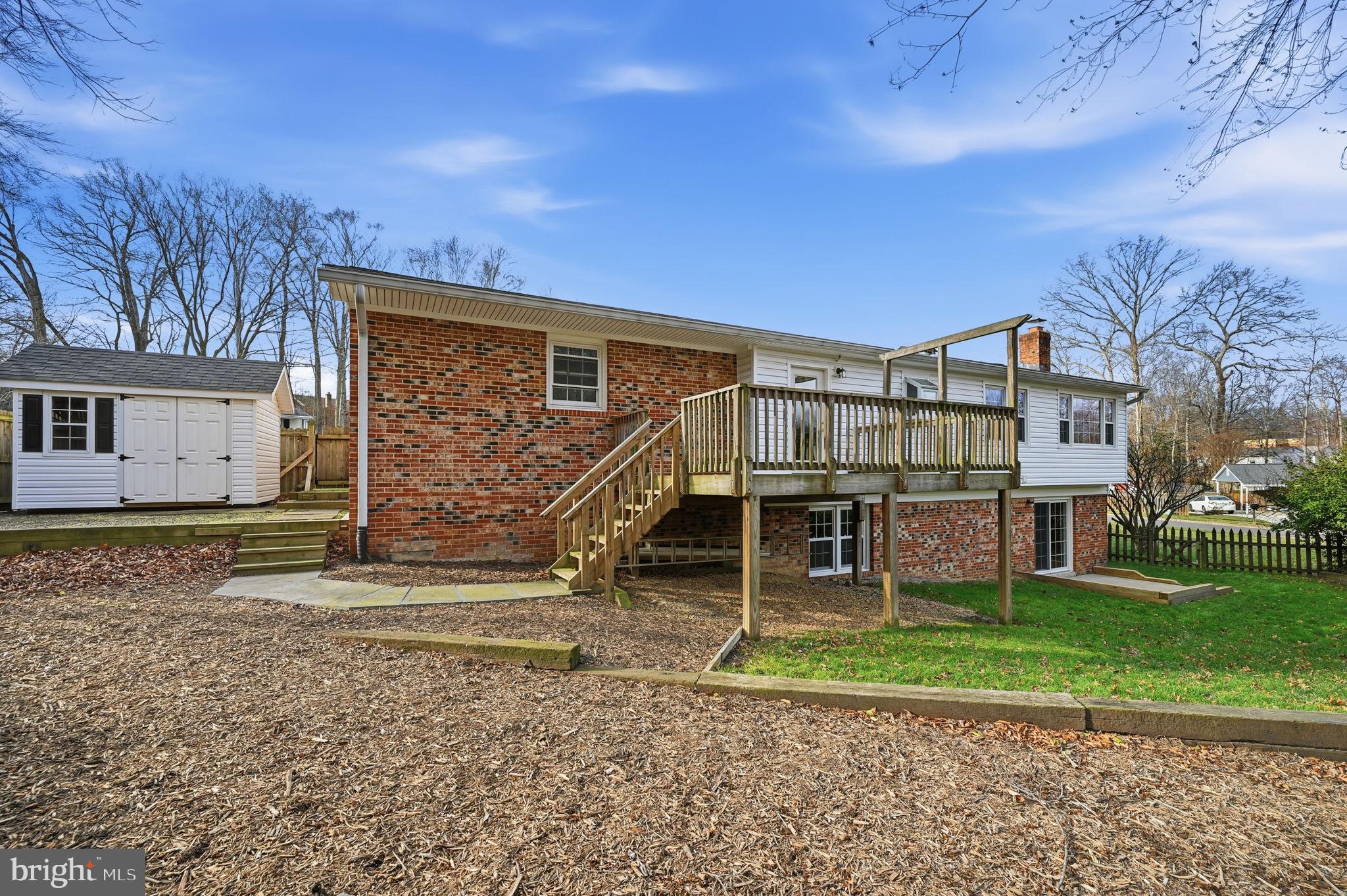 9322 Elk Drive Springfield, VA 22153 - Photo 8 of 40 Fully fenced rear yard with deck, patio and shed!