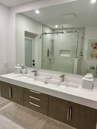 a bathroom with a toilet and shower