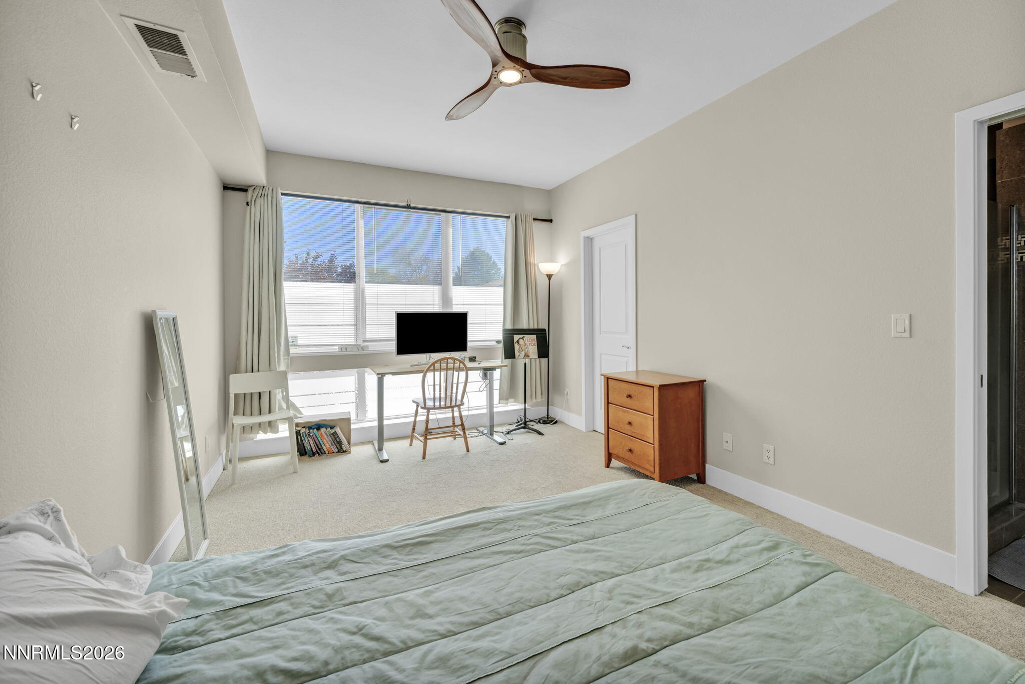 326 State Street Reno, NV 89501 - Photo 31 of 49 a room with a bed and a flat screen tv