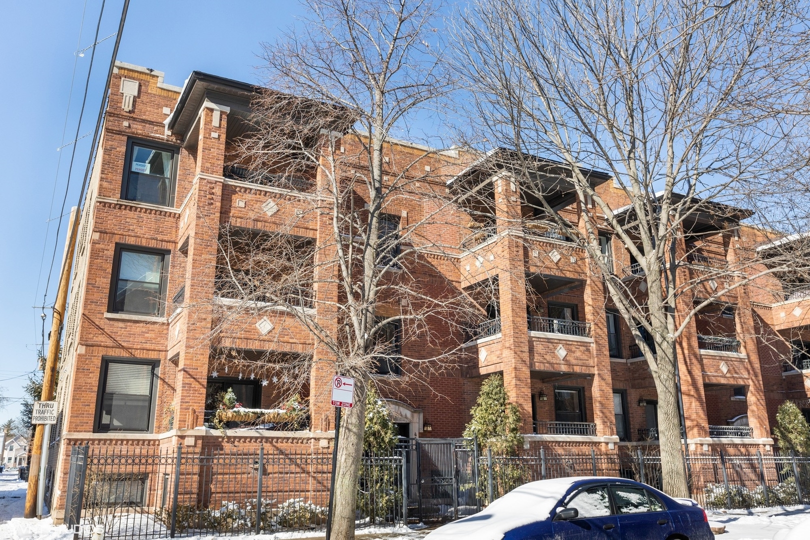 4544 North Spaulding Avenue, Unit 1 Chicago, IL 60625 - Photo 1 of 5 a view of a street with a building