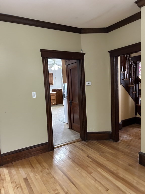 23 Greendale Avenue Worcester, MA 01606 - Photo 12 of 30 a view of a hallway with wooden floor and closet