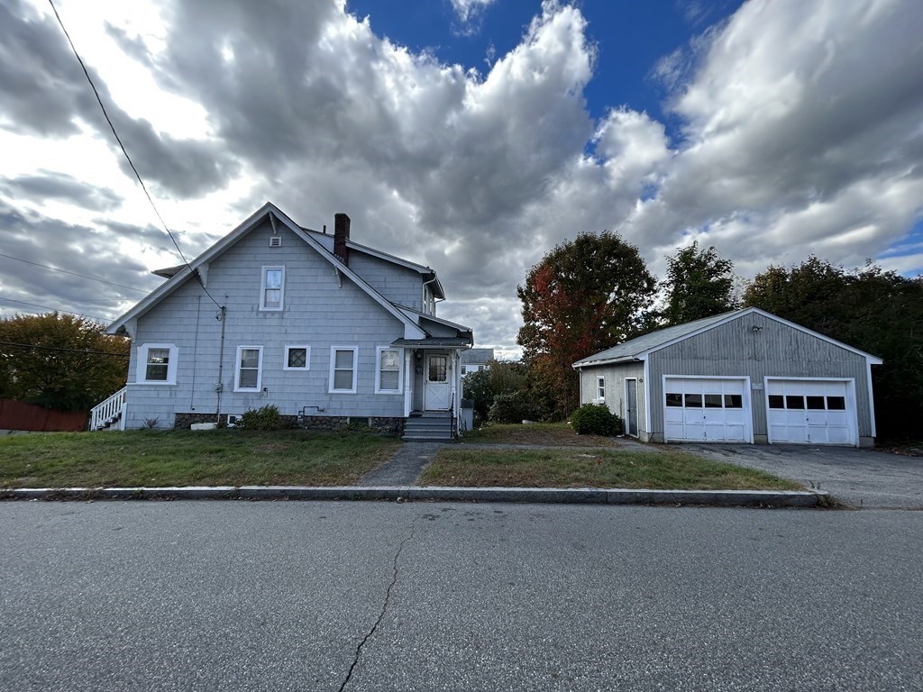 23 Greendale Avenue Worcester, MA 01606 - Photo 2 of 30 a front view of a house with a garden