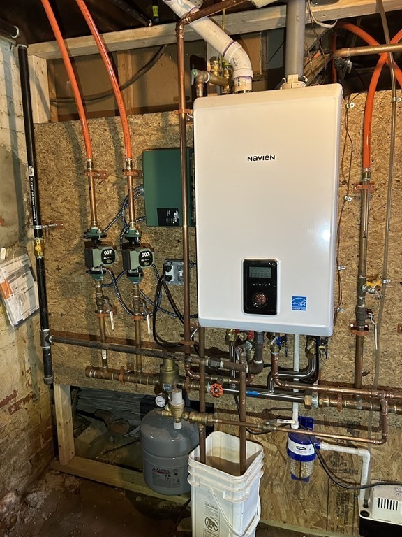 23 Greendale Avenue Worcester, MA 01606 - Photo 30 of 30 a view of two chairs and a table in the patio