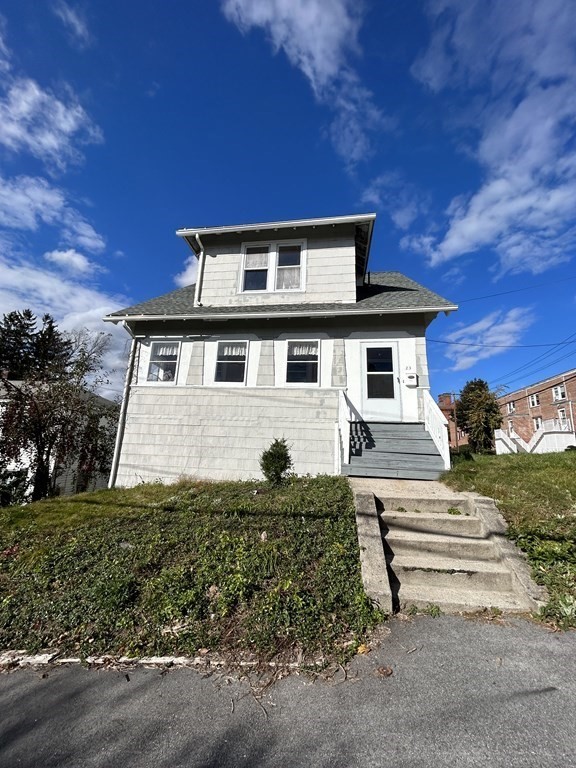 23 Greendale Avenue Worcester, MA 01606 - Photo 3 of 30 front view of a house with a yard