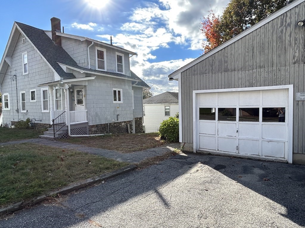 23 Greendale Avenue Worcester, MA 01606 - Photo 5 of 30 a front view of a house with a yard