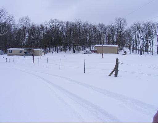 2360 South Bridge Road Washington, PA 15301 - Photo 1 of 3 Exterior Front. Fenced for horses. Newer mobile designed for 2 master bedroom in each end of mobile.