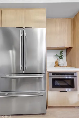 a close view of a stove top oven sitting inside of a kitchen