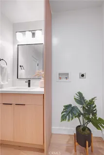 a bed room with a bed and a chair