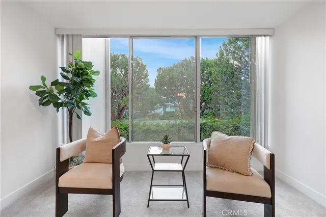 a bedroom with a bed and a lamp