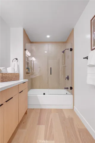 a front view of a residential apartment building with a yard