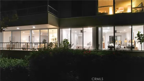 an aerial view of a house with outdoor space