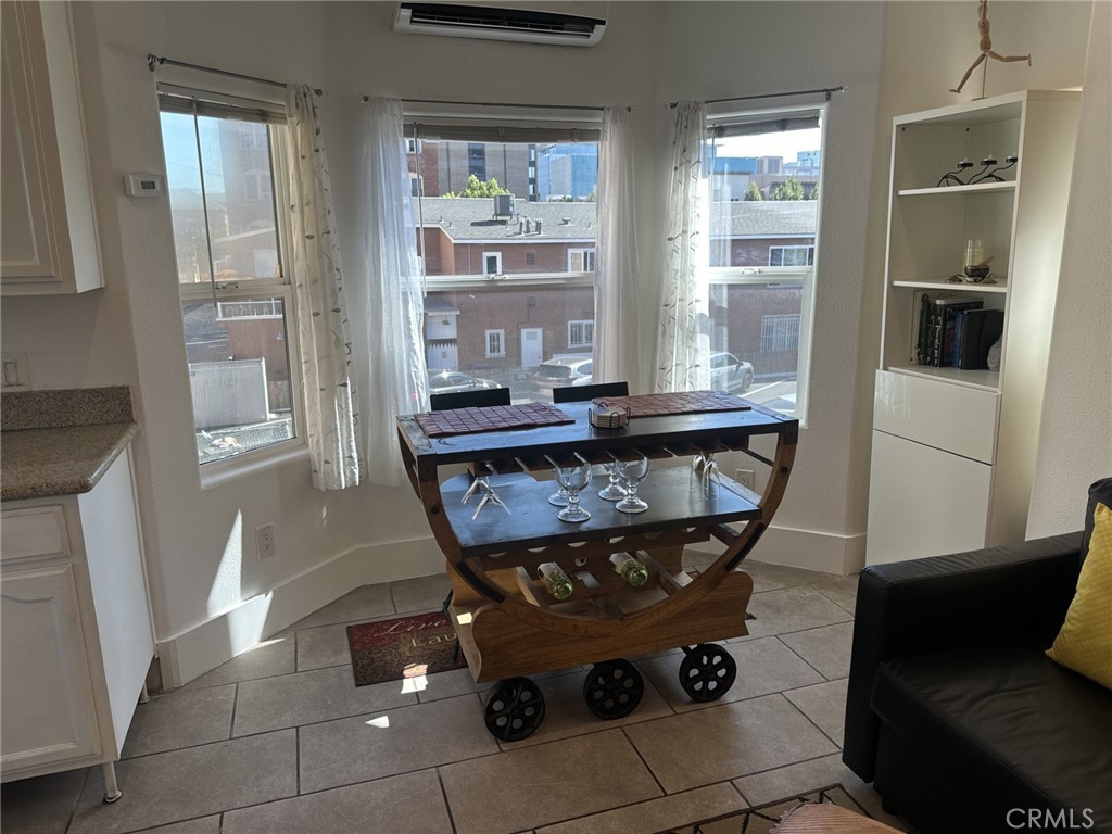 354 Chestnut Avenue, Unit 33 Long Beach, CA 90802 - Photo 3 of 18 a room with pool table and windows