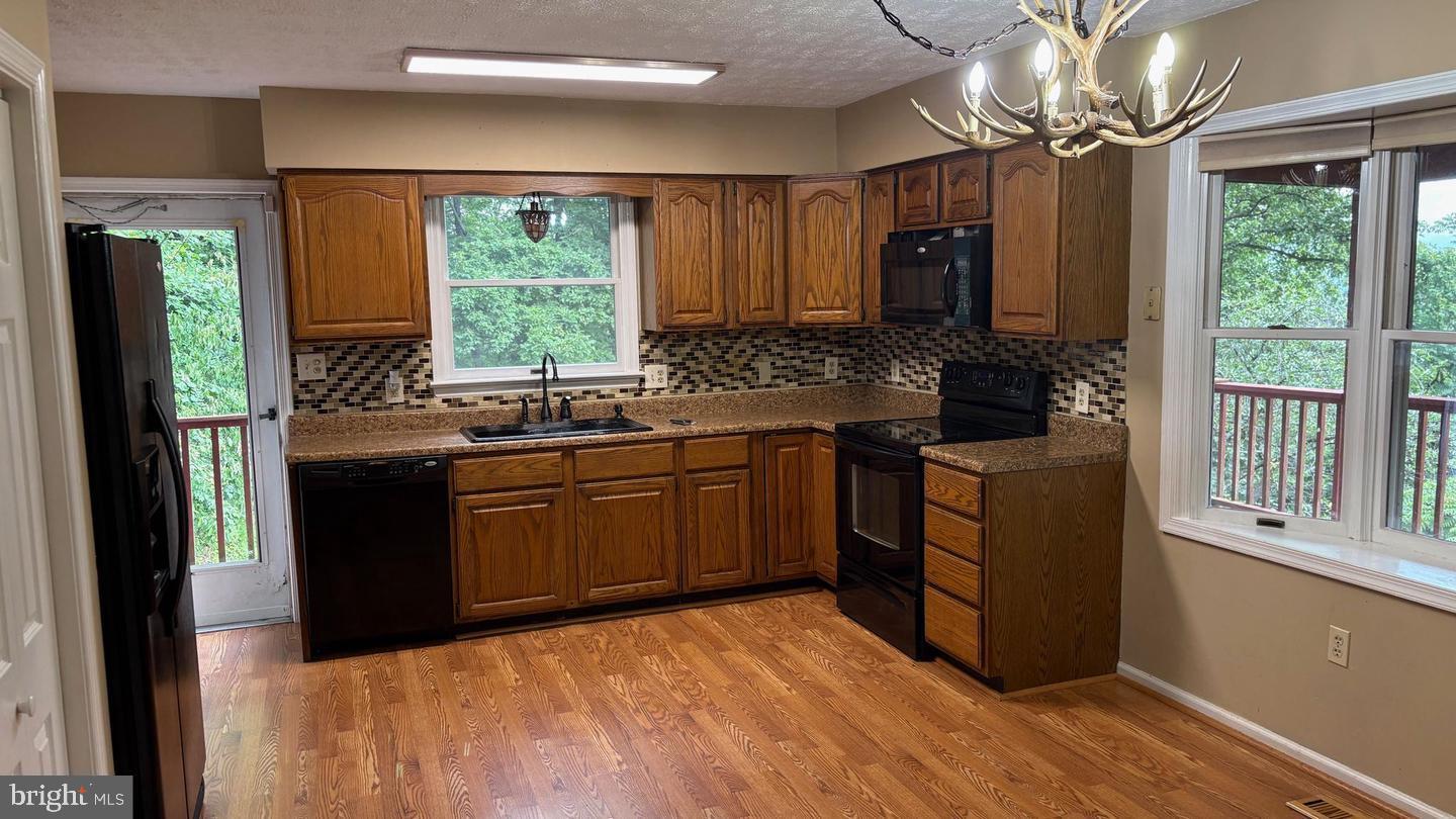 287 Blackthorne Road, Unit LURAY Stanley, VA 22851 - Photo 13 of 96 Eat in kitchen with modern finishes.