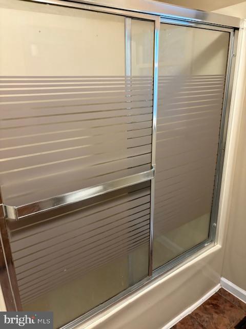 287 Blackthorne Road, Unit LURAY Stanley, VA 22851 - Photo 35 of 96 Sleek glass shower enclosure with modern lines.