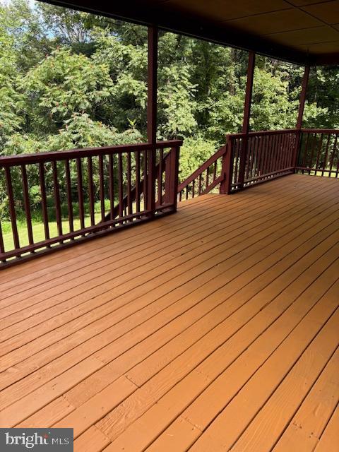 287 Blackthorne Road, Unit LURAY Stanley, VA 22851 - Photo 55 of 96 a view of balcony with wooden floor