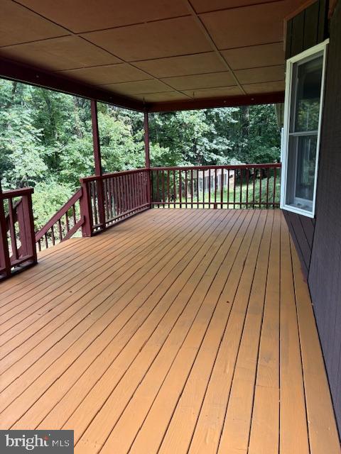 287 Blackthorne Road, Unit LURAY Stanley, VA 22851 - Photo 56 of 96 a view of balcony with wooden floor