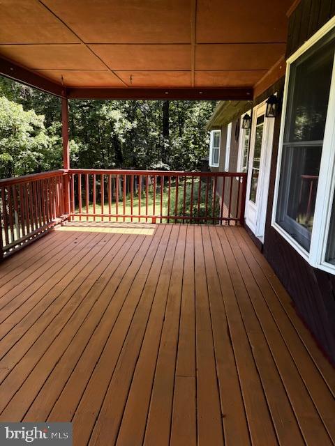 287 Blackthorne Road, Unit LURAY Stanley, VA 22851 - Photo 57 of 96 a view of deck with wooden floor