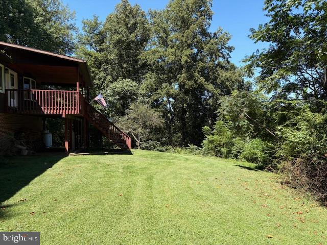 287 Blackthorne Road, Unit LURAY Stanley, VA 22851 - Photo 93 of 96 a view of an house with backyard and trees